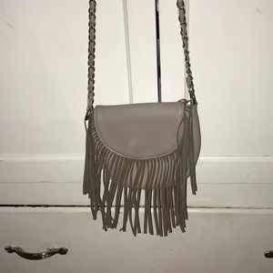 grey strap bag with grey frills